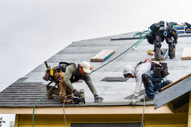Professional Gutter Installation technician working in Marion, MS